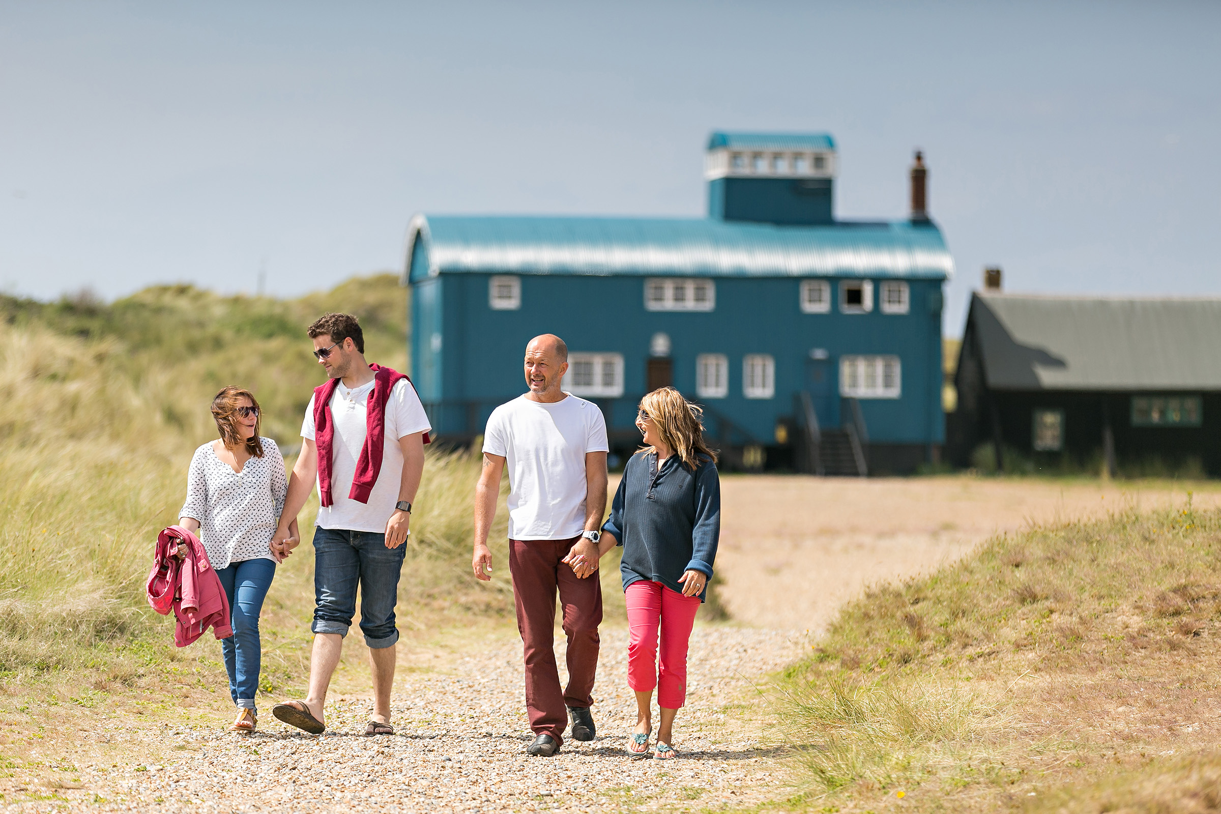 Couples walking at Blakeney Point